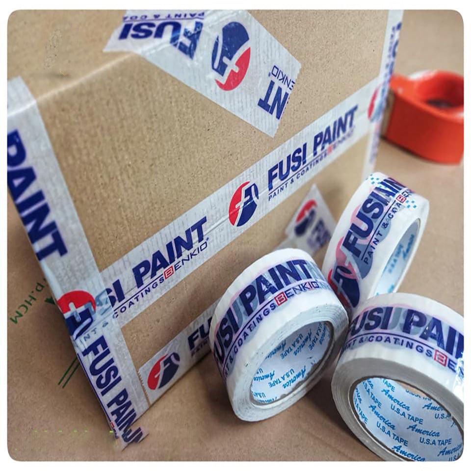 Custom stickers and adhesive tape for packaging needs. The image shows high-quality adhesive tape, approximately 2 inches by 110 yards, and custom stickers featuring a company logo. The tape and stickers are designed to enhance branding and ensure secure packaging. Ideal for sealing boxes, wrapping products, and adding a professional touch to shipments. Contact information for ordering is provided.